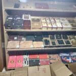 Shelves of various cigar boxes and packaging.