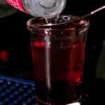 Pouring Boyarskiy shot into glass.