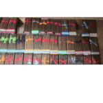 Assorted flavored cigars with colorful ribbons.