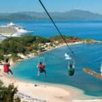 Ziplining with stunning beach and cruise ship view.