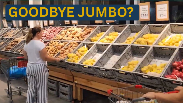 Woman shopping for potatoes at grocery store